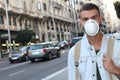 Man wearing face mask due to disgusting odor