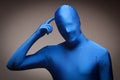 Man Wearing Full Blue Nylon Bodysuite Scratching H