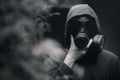 A man wearing a gas mask  and the gloomy atmosphere Royalty Free Stock Photo