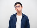 Man wearing glasses feeling bored looking up on space white background