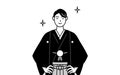 Man wearing Hakama with crest with his hands on his hips