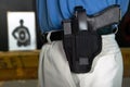 Man wearing a handgun in a webbing holster Royalty Free Stock Photo