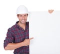 Man Wearing Hard Hat Holding Placard Royalty Free Stock Photo