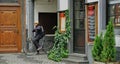 Man on bicycle on cobblestone street in Cologne, Germany