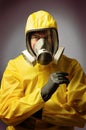 Man wearing a hazmat suit and mask