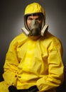 Man wearing a hazmat suit and mask