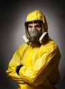 Man wearing a hazmat suit and mask