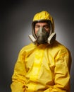 Man wearing a hazmat suit and mask