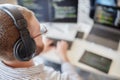 Man Wearing Headphones While Working on Computer Code Royalty Free Stock Photo