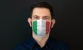 Man wearing Italian flag protective medical face mask Royalty Free Stock Photo