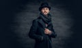 A man wearing jacket and cylinder hat. Royalty Free Stock Photo