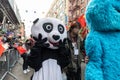 Man wearing a panda mask at the 25th Annual Chinese Lunar New Year Parade and Festival