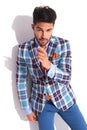 Man wearing plaid jacket posing