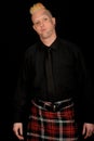 Man wearing plaid kilt Royalty Free Stock Photo