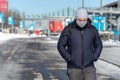 Man wearing protection mask walking in Old Montreal during Coronavirus Pandemic Royalty Free Stock Photo