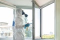 Man wearing protective biological suit and gas-mask due to mers coronavirus global pandemic warning and danger. Medic Royalty Free Stock Photo