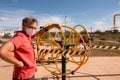 A man wearing a protective face mask at an outdoor public fitness park Royalty Free Stock Photo