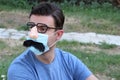 Man wearing protective mask with funny complements