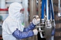 Man Wearing Protective Suit at Factory Royalty Free Stock Photo