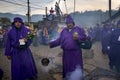 Man wearing purple robesin a procession during the Easter celebrations, in the Holy Week, in Antigua, Guatemala. Royalty Free Stock Photo