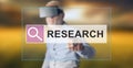 Man wearing a reality virtual headset touching a research concept on a touch screen Royalty Free Stock Photo