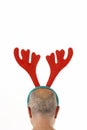 Man Wearing Reindeer Antlers Royalty Free Stock Photo