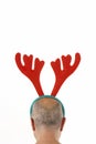 Man Wearing Reindeer Antlers