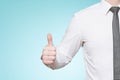 Man wearing shirt and tie thumbs up