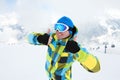 Man wearing ski equipment, smiling on slope Royalty Free Stock Photo