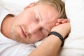 Man Wearing Smart Wristband While Sleeping