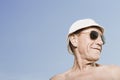 Man wearing sunhat and sunglasses Royalty Free Stock Photo