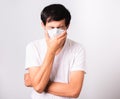 Man wearing surgical hygienic protective cloth face mask against coronavirus he sneeze Royalty Free Stock Photo