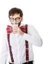 Man wearing suspenders drinking milk. Royalty Free Stock Photo