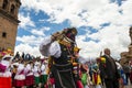 Man wearing traditional clothes and masks dancing the Huaylia in the Christmas day in front of the Cuzco Cathedral in Cuzco, Peru.