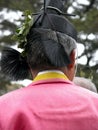 Man wearing a traditional dress during a shinto ceremony in Japan