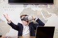 Man wearing virtual reality goggles,Businessman making gestures Royalty Free Stock Photo