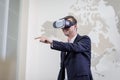 Man wearing virtual reality goggles,Businessman making gestures Royalty Free Stock Photo