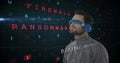 Man wearing VR headset exploring digital security concepts with floating text