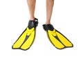 Man wearing yellow flippers on white background Royalty Free Stock Photo