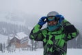 A man wears a ski mask. recreation skier in the mountains