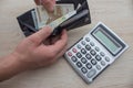 Man weeds off cash out of his wallet. Wealthy man counting his money Royalty Free Stock Photo