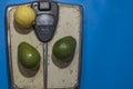 Man weighing himself to check the effectiveness of lemon and avocado diet