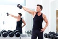 Man with weight training equipment on sport gym Royalty Free Stock Photo