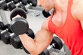 Man with weight training equipment on sport gym