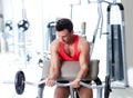 Man with weight training equipment on sport gym