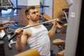 Man with weight training in gym equipment sport club Royalty Free Stock Photo