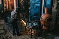 Man welding in a dark street in the Medina Market