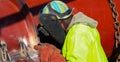 Man welding metal on a construction site Royalty Free Stock Photo