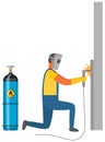 Man welding metal near gas cylinder. Welder works with equipment next to flammable container