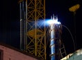 Man welding the roof at night Royalty Free Stock Photo